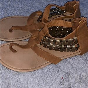Tan and gold sandals